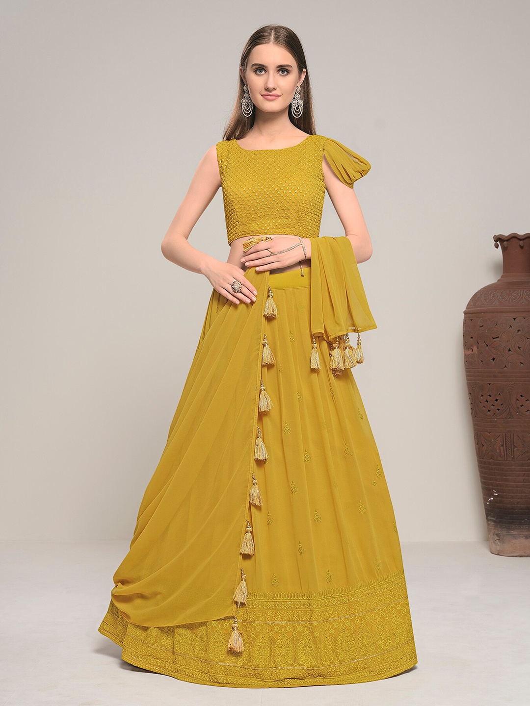 

DRESSTIVE Yellow Embroidered Sequinned Semi-Stitched Lehenga & Unstitched Blouse With Dupatta