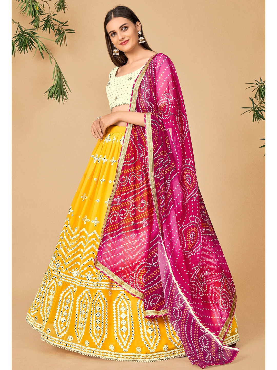 

DRESSTIVE Yellow & Pink Embroidered Thread Work Semi-Stitched Lehenga & Unstitched Blouse With Dupatta