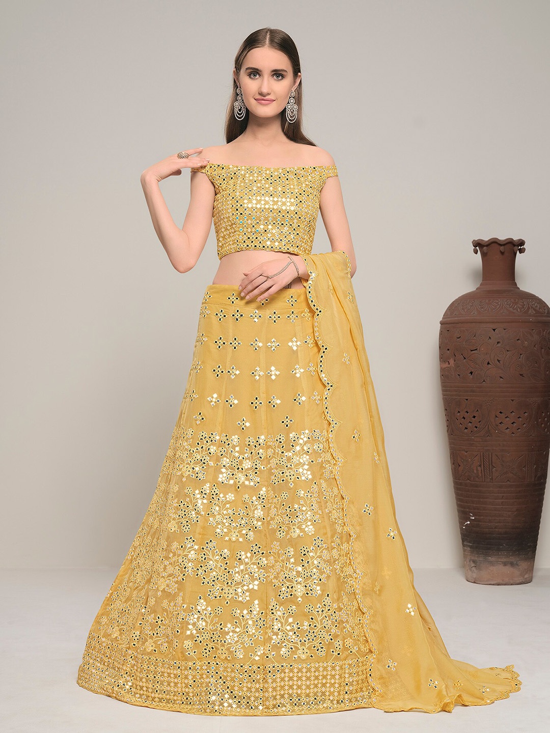 

DRESSTIVE Yellow Embroidered Mirror Work Semi-Stitched Lehenga & Unstitched Blouse With Dupatta