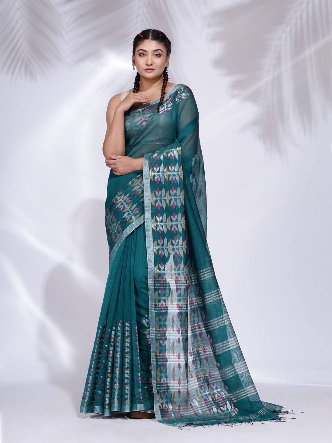

Charukriti Teal & Pink Woven Design Nakshi Border Saree