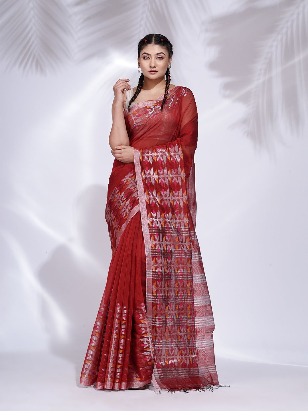 

Charukriti Women Red & Silver-Toned Solid Woven Design Saree