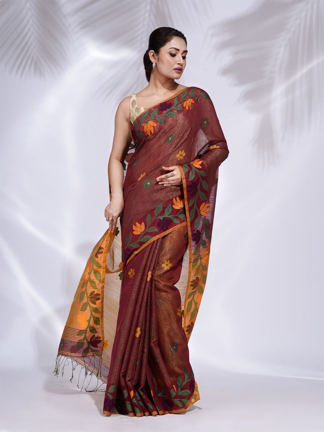 

Charukriti Maroon & Mustard Floral Tissue Saree