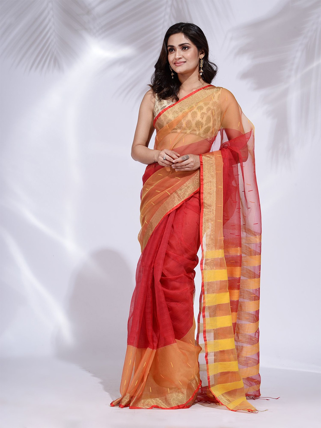 

Charukriti Women Red & Yellow Woven Design Cotton Blend Saree