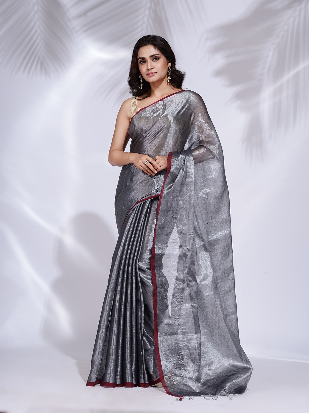 

Charukriti Grey Woven Design Tissue Saree