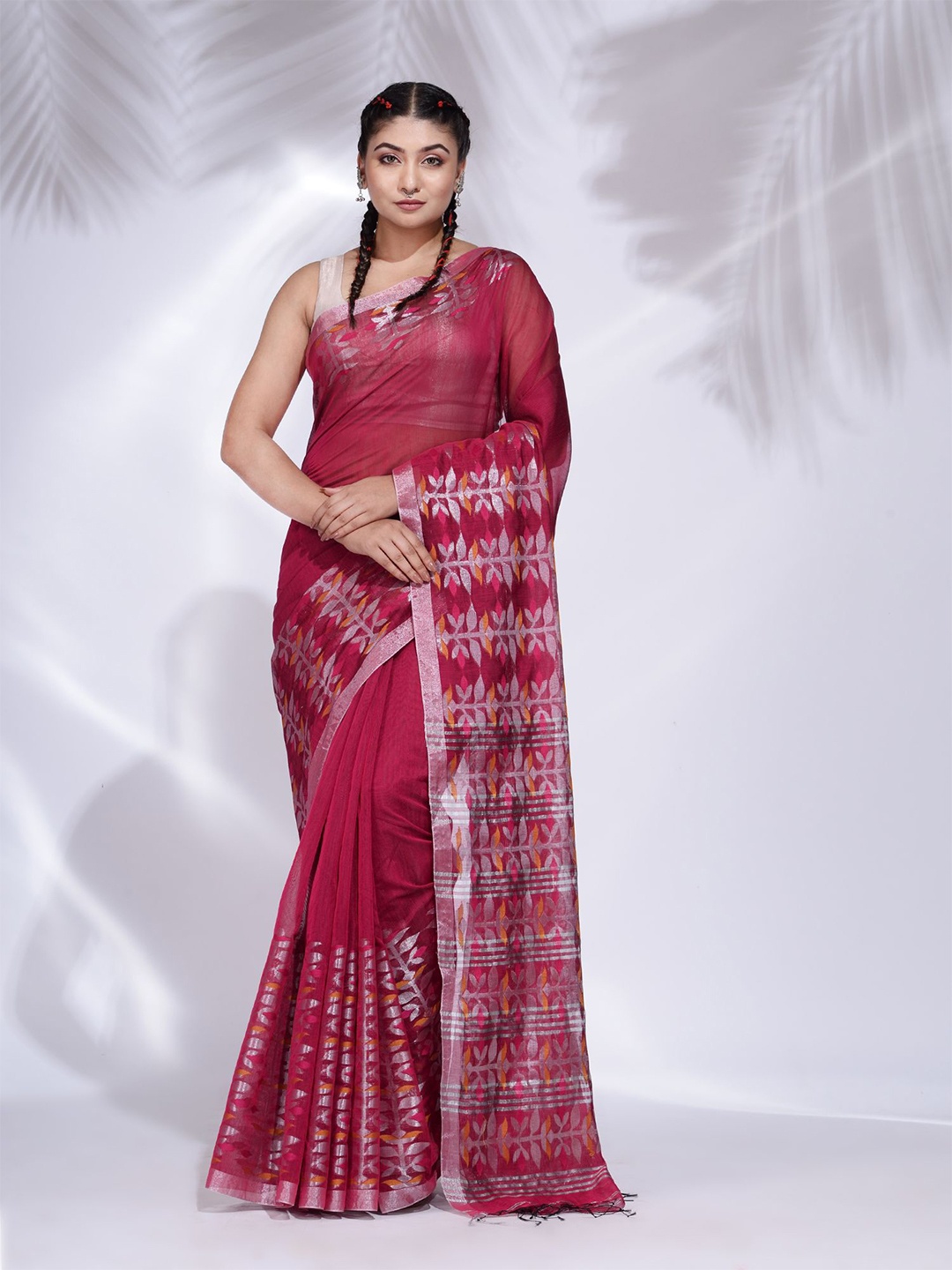 

Charukriti Fuchsia & Silver-Toned Floral Zari Saree