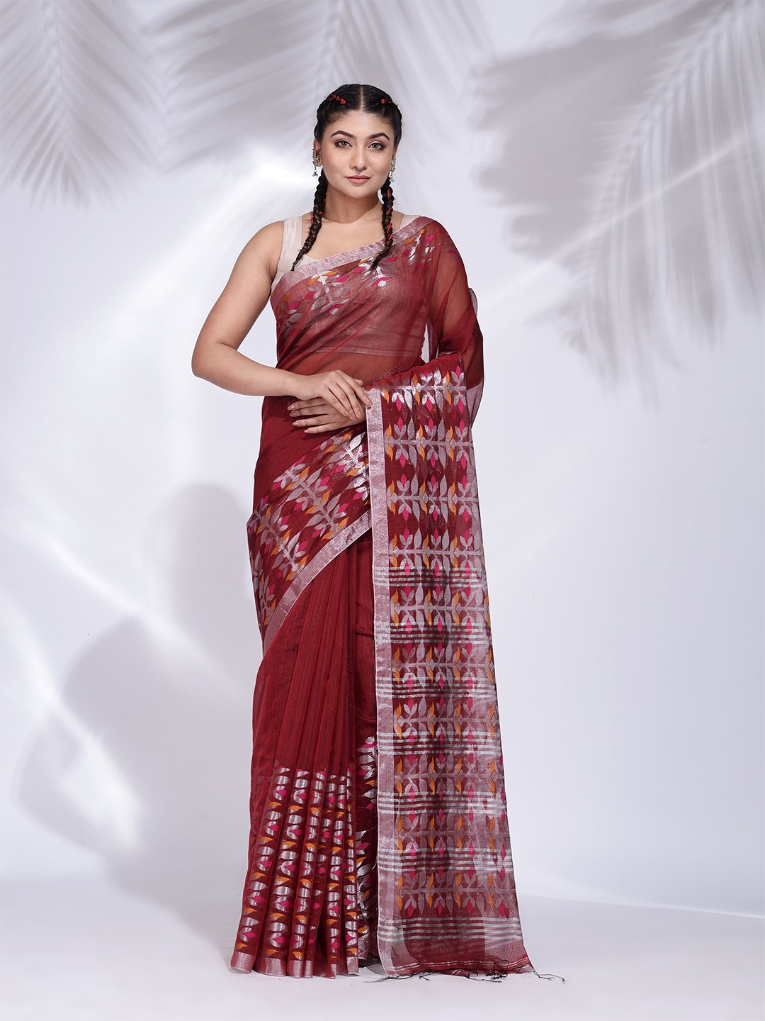 

Charukriti Maroon & Silver-Toned Woven Design Saree