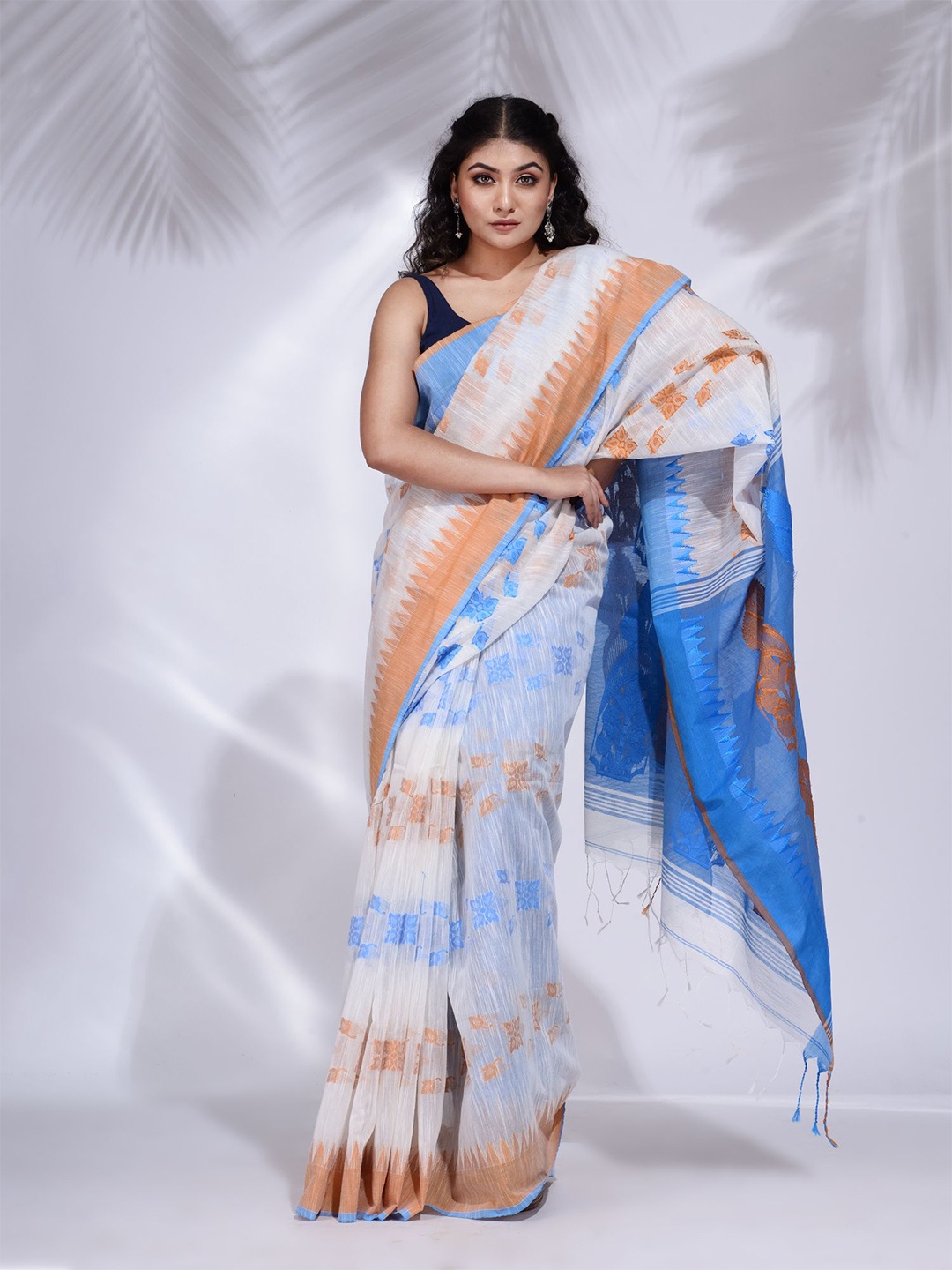 

Charukriti Women White Khadi handwoven saree with temple border