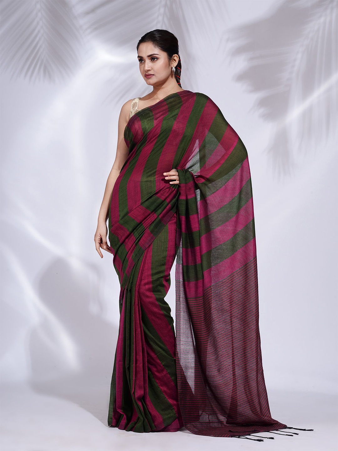 

Charukriti Green & Magenta Striped Pure Cotton Saree