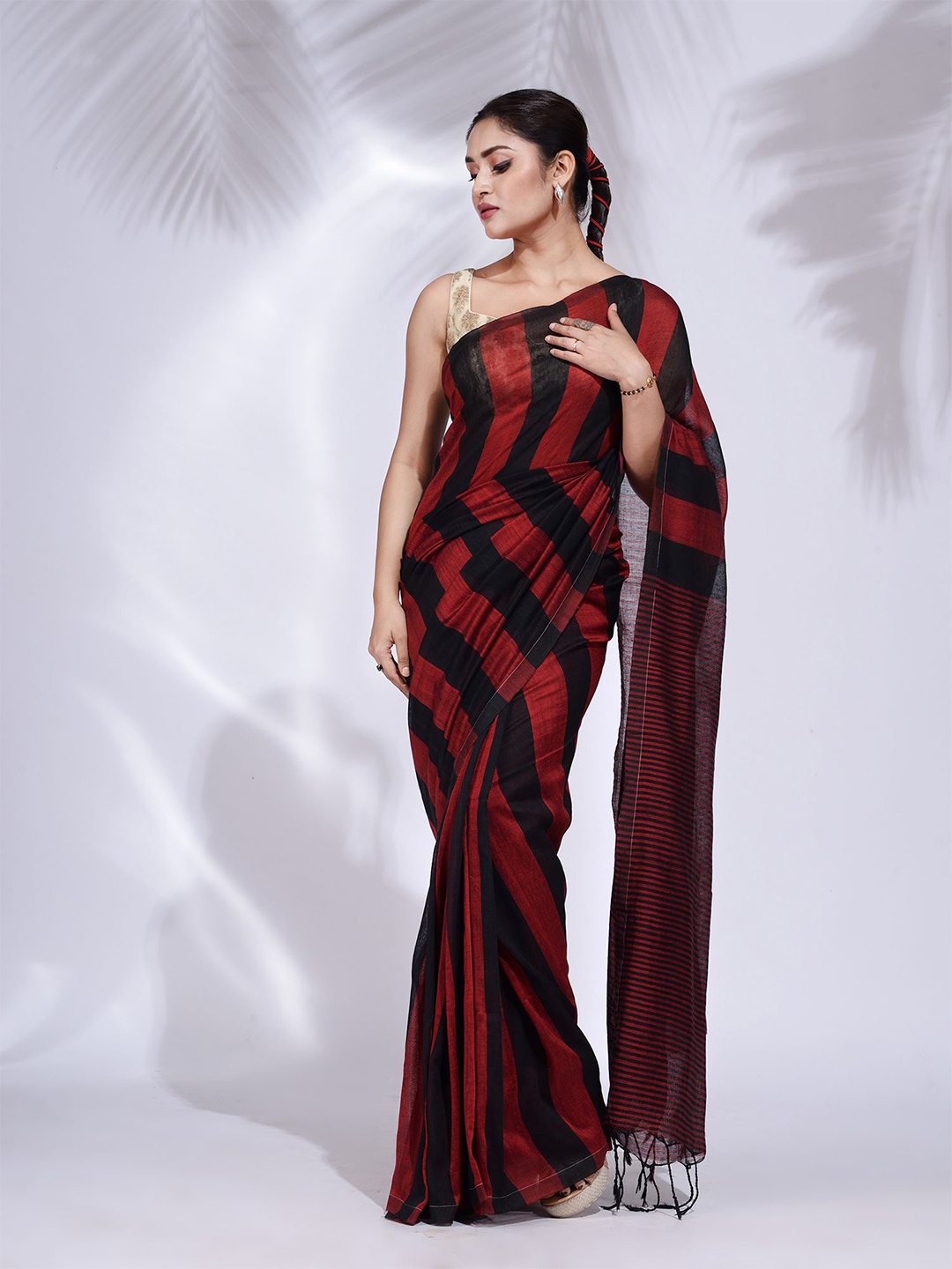 

Charukriti Red & Black Striped Pure Cotton Saree