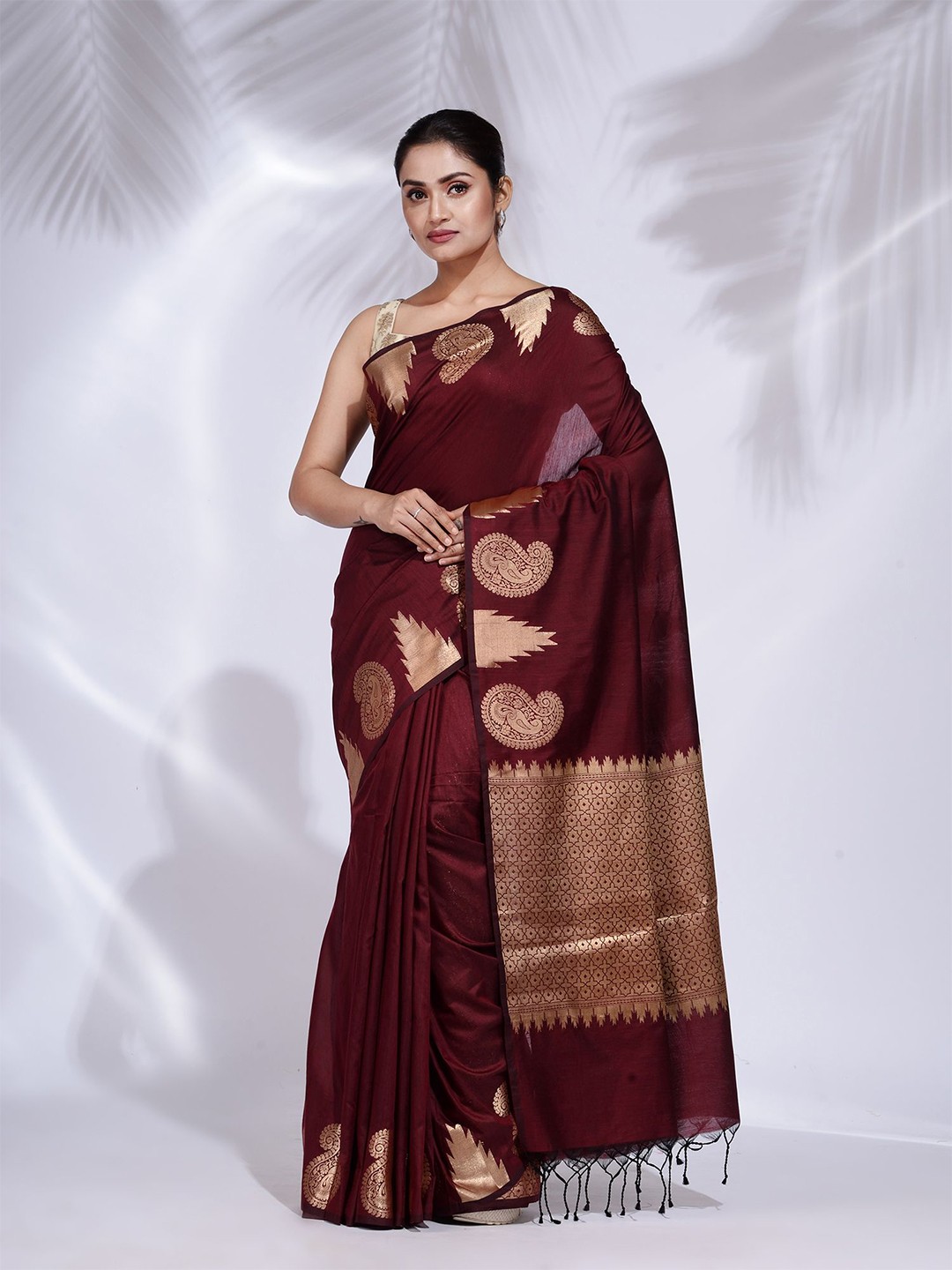 

Charukriti Maroon & Gold-Toned Zari Pure Silk Saree