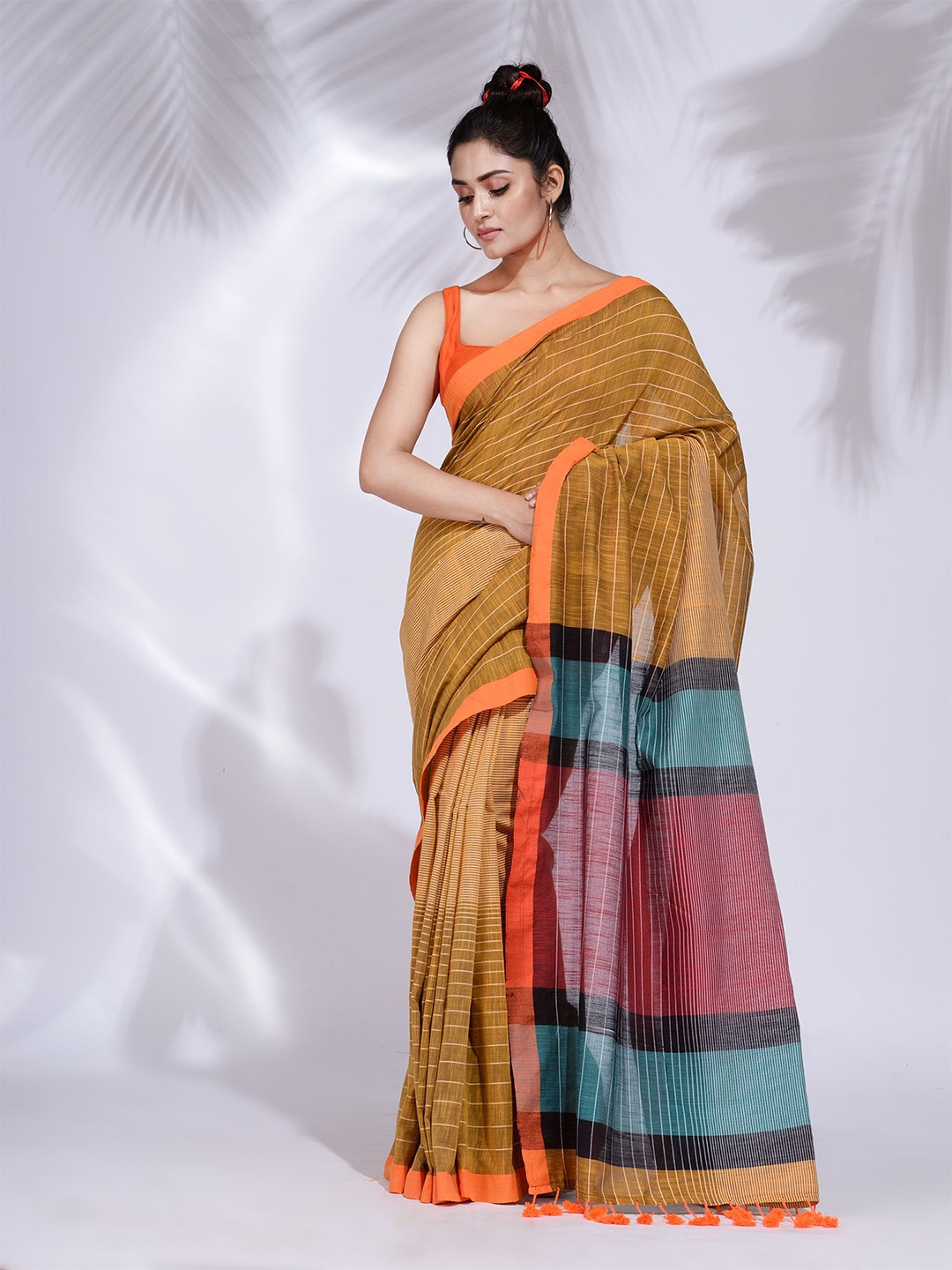 

Charukriti Mustard & Orange Woven Design Pure Cotton Saree