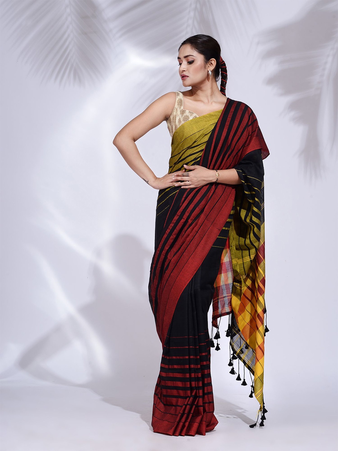

Charukriti Women Black & Mustard Striped Pure Cotton Saree