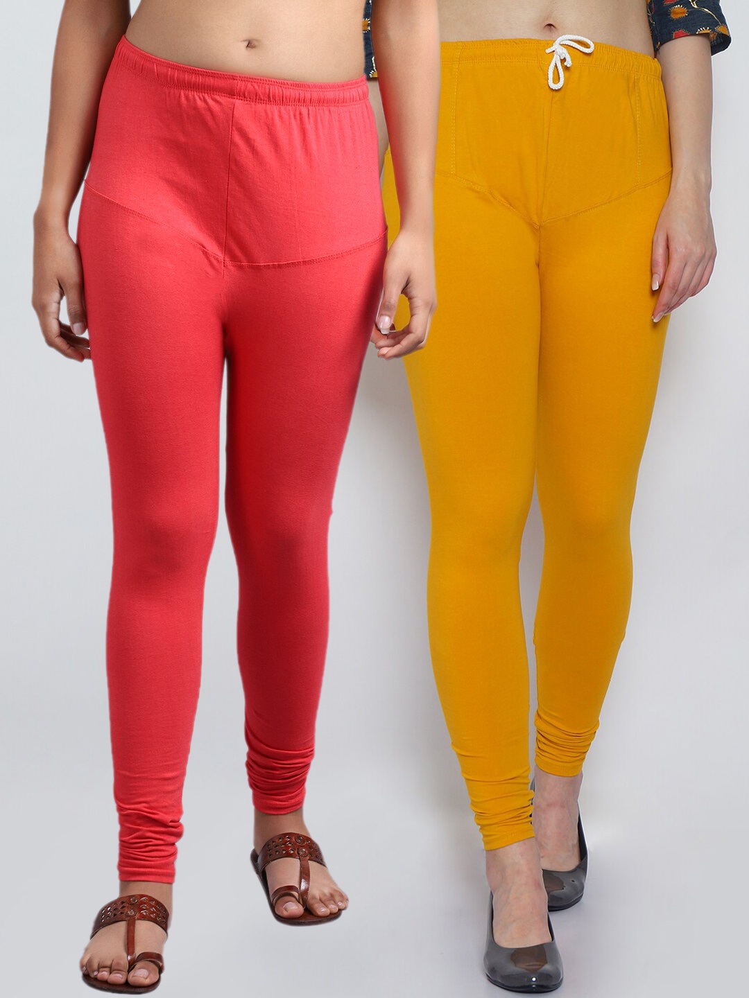 

GRACIT Women Pack Of 2 Orange & Yellow Solid Churidar-Length Leggings