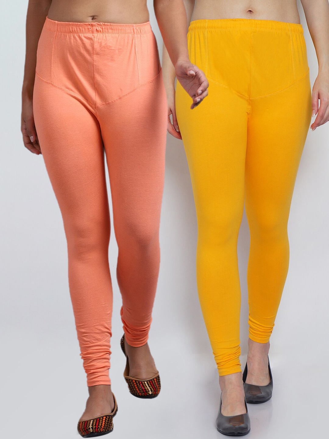 

GRACIT Women Pack Of 2 Yellow & Peach Solid Super Lycra Churidar-Length Leggings