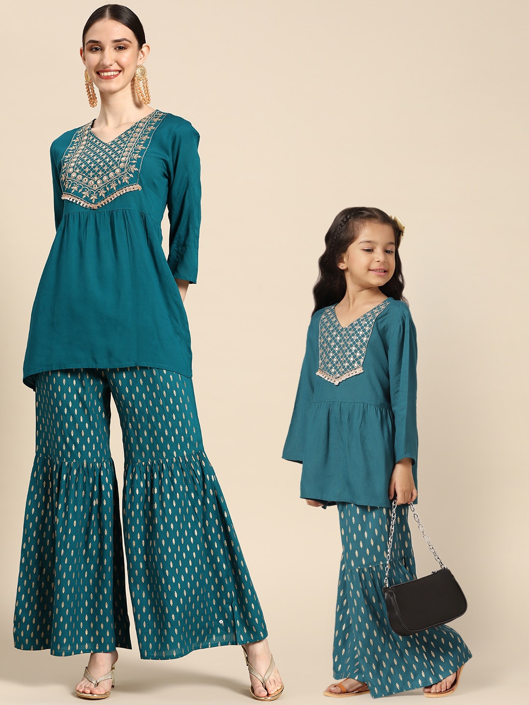 

Sangria Girls Sequinned Yoke Design Ethnic Motifs Print Kurti with Sharara, Teal