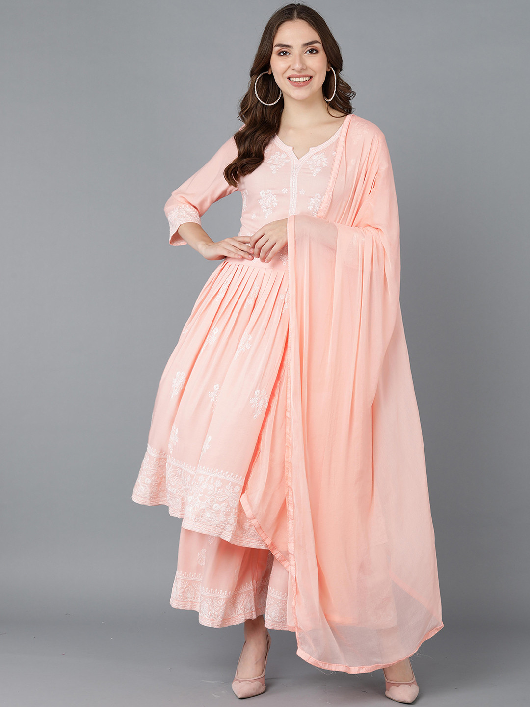 

AHIKA Women Peach Floral Embroidered Pleated Kurta with Palazzos & Dupatta