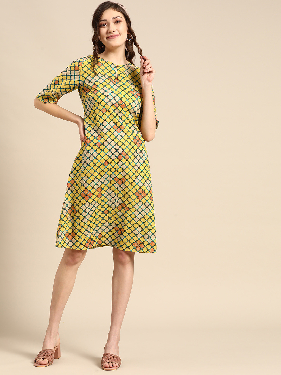 

Sangria Yellow & Beige Pure Cotton Printed Ethnic A-Line Dress