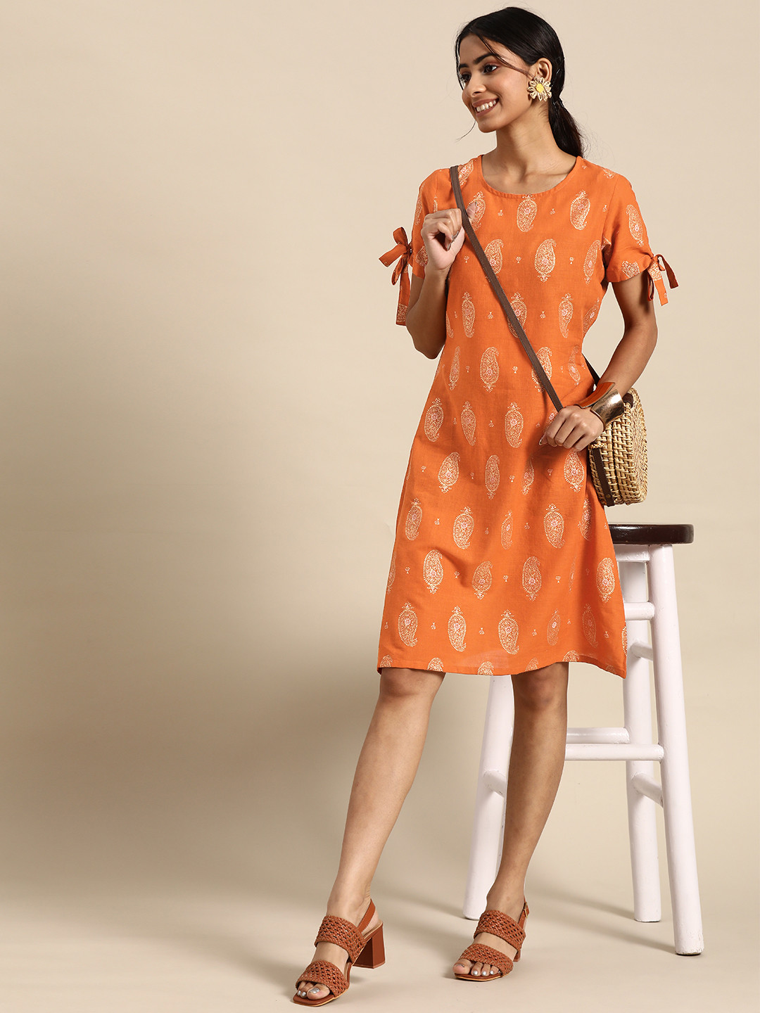 

Sangria Women Pure Cotton Paisley Print A-line Knee Length Dress, Mustard