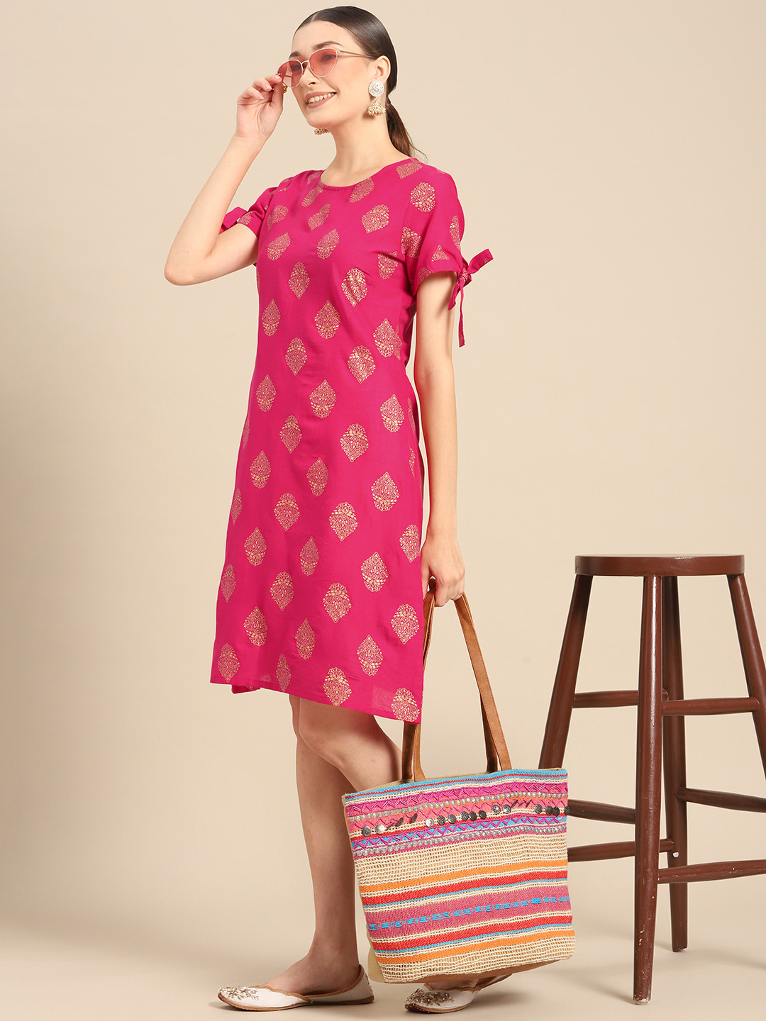

Sangria Women Fuchsia Pink & Golden Ethnic Motifs Printed Pure Cotton A-line Dress