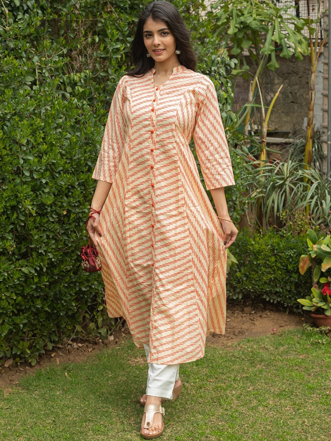 

SVARCHI Women Orange & White Flared Sleeves Anarkali Kurta