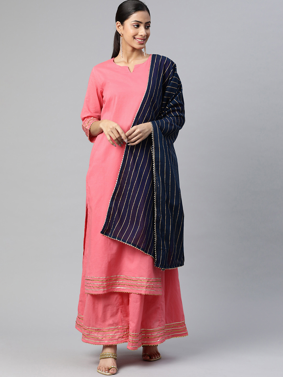 

SVARCHI Women Pink Solid Pure Cotton Kurta with Palazzos & With Dupatta