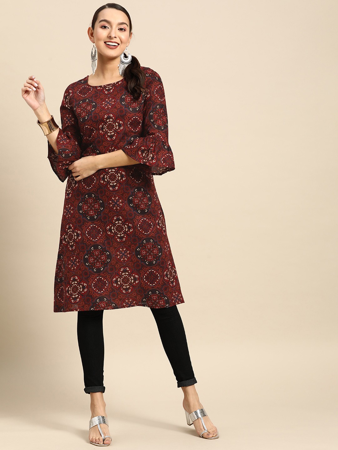 

Sangria Women Pure Cotton Ethnic Motifs Printed Bell Sleeves Kurta, Maroon