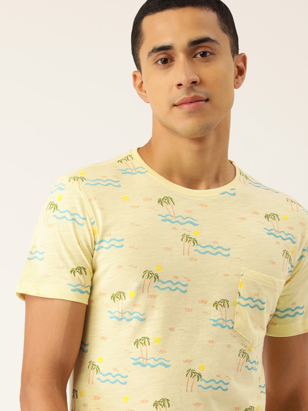 

Peter England Casuals Men Yellow & Green Tropical Printed T-shirt