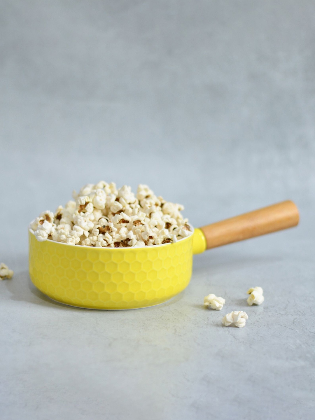 

Nestasia Yellow Ceramic Matte Bowl with Wooden Handle