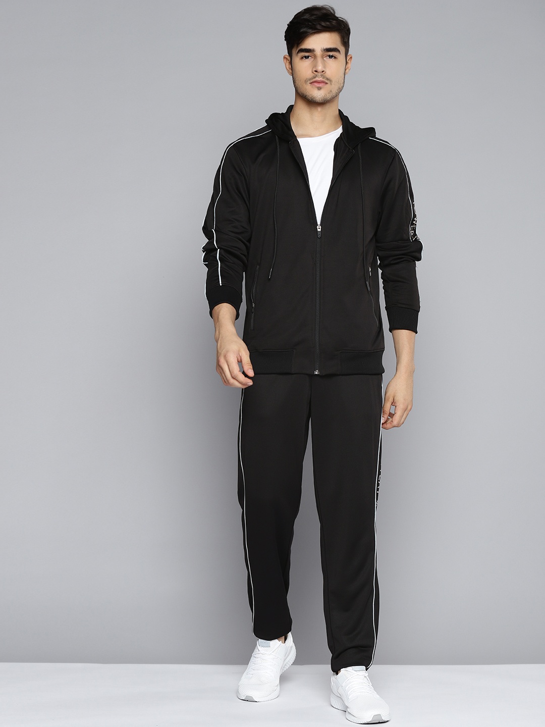 

Alcis Men Black Solid Tracksuit with Side Detail