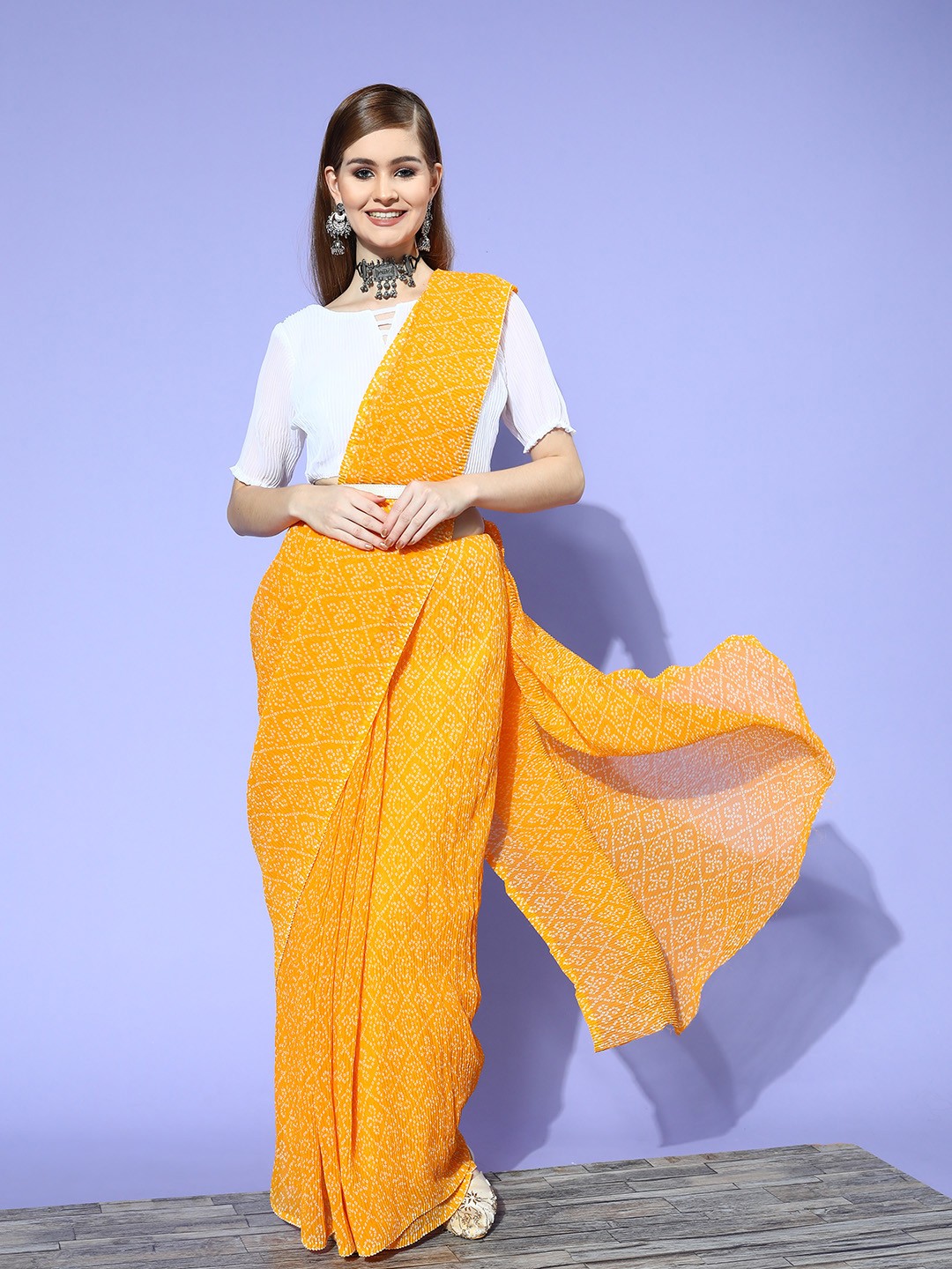 

Satrani Yellow & White Bandhani Saree