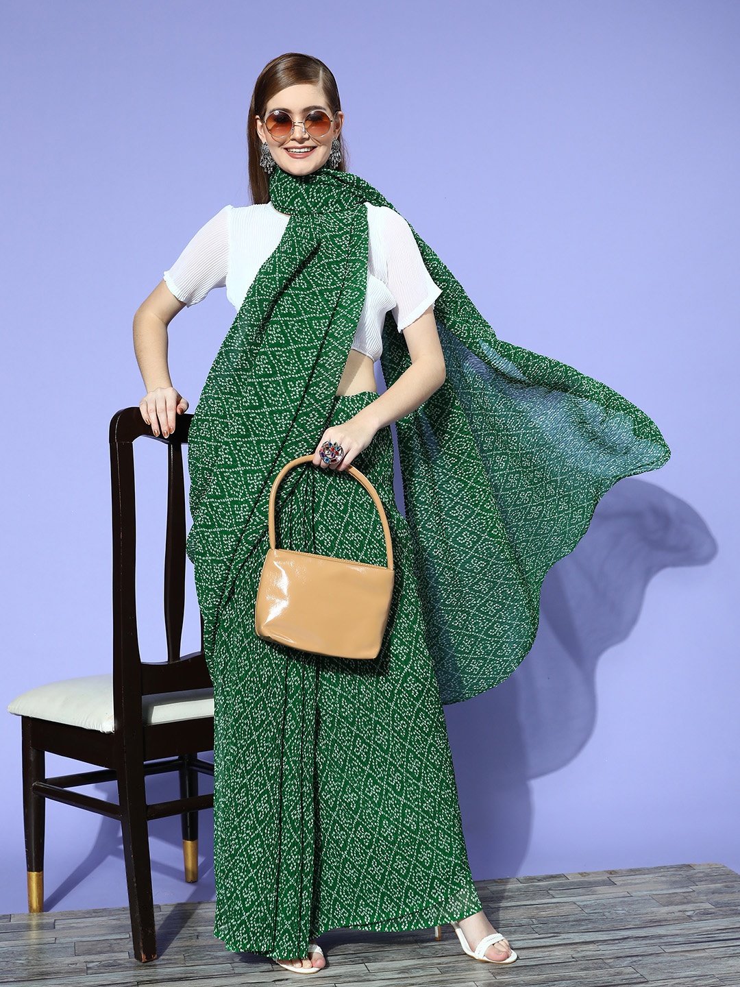 

Satrani Green & White Bandhani Saree