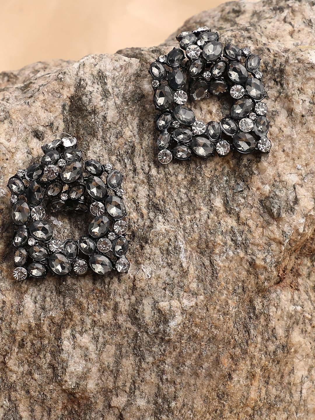 

SOHI Black Contemporary Studs Earrings