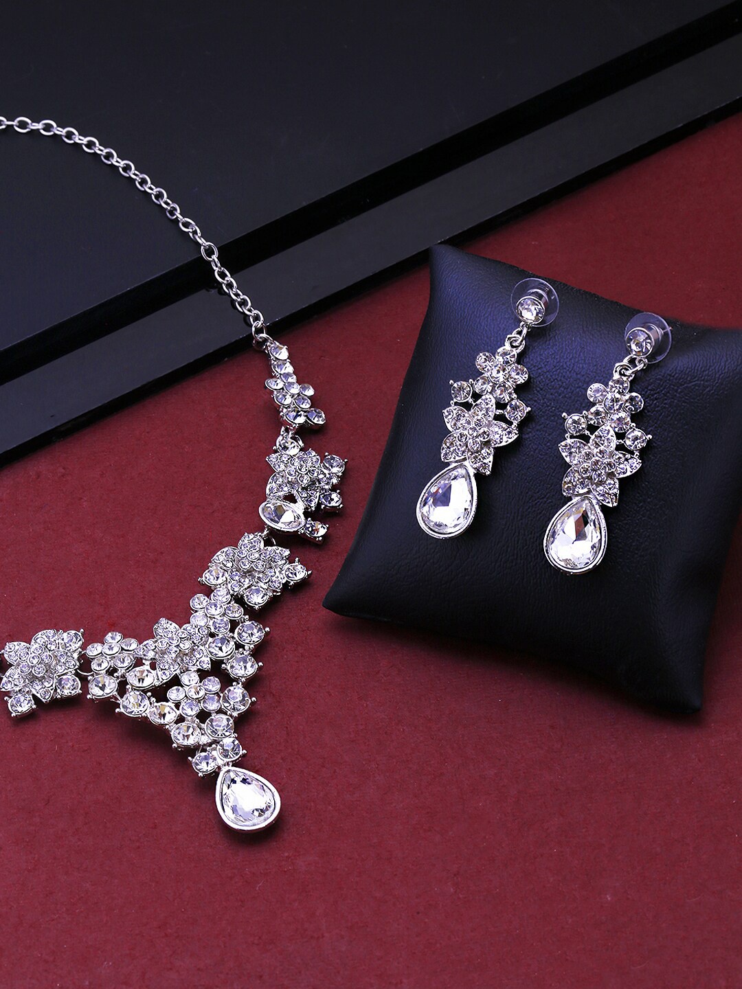 

Unwind by Yellow Chimes White Silver-Plated American Diamond Studded Jewellery Set