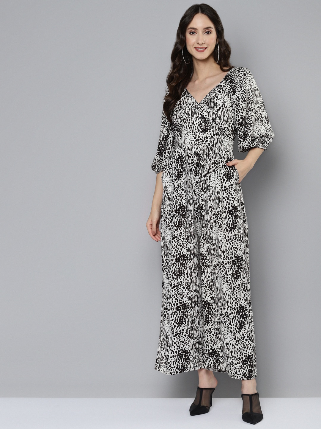 

Femella White & Black Animal Printed Basic Jumpsuit with Ruffles