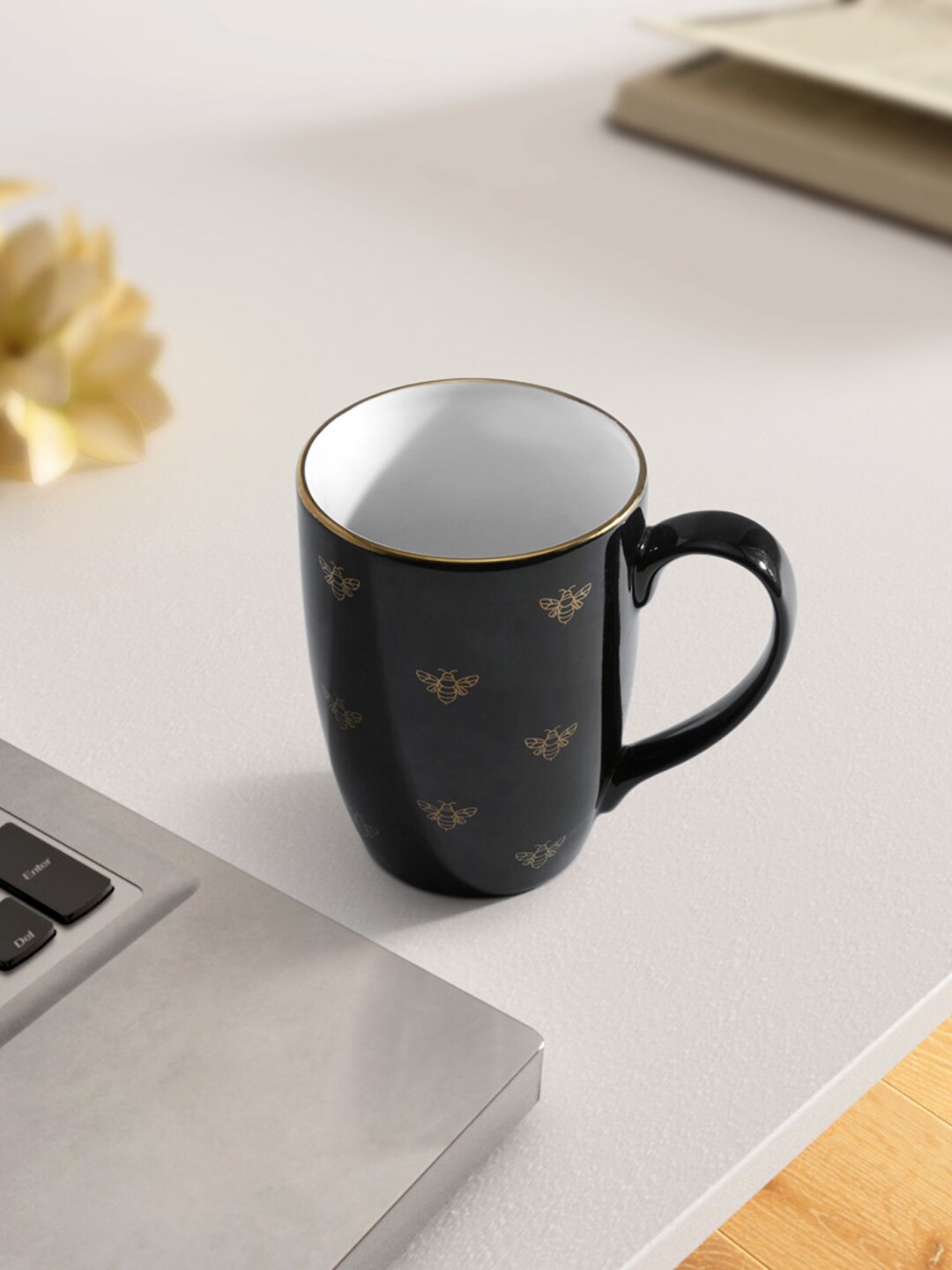 

Living scapes by Pantaloons Black & Gold-Toned Printed Bone China Glossy Mug 300ml