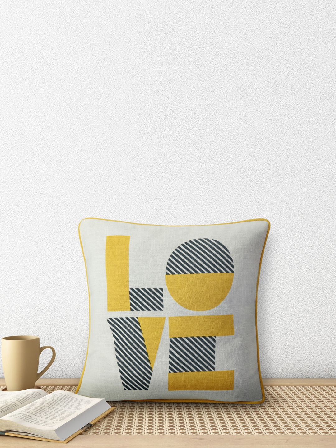 

Living scapes by Pantaloons Off White & Yellow Geometric Square Cushion Covers