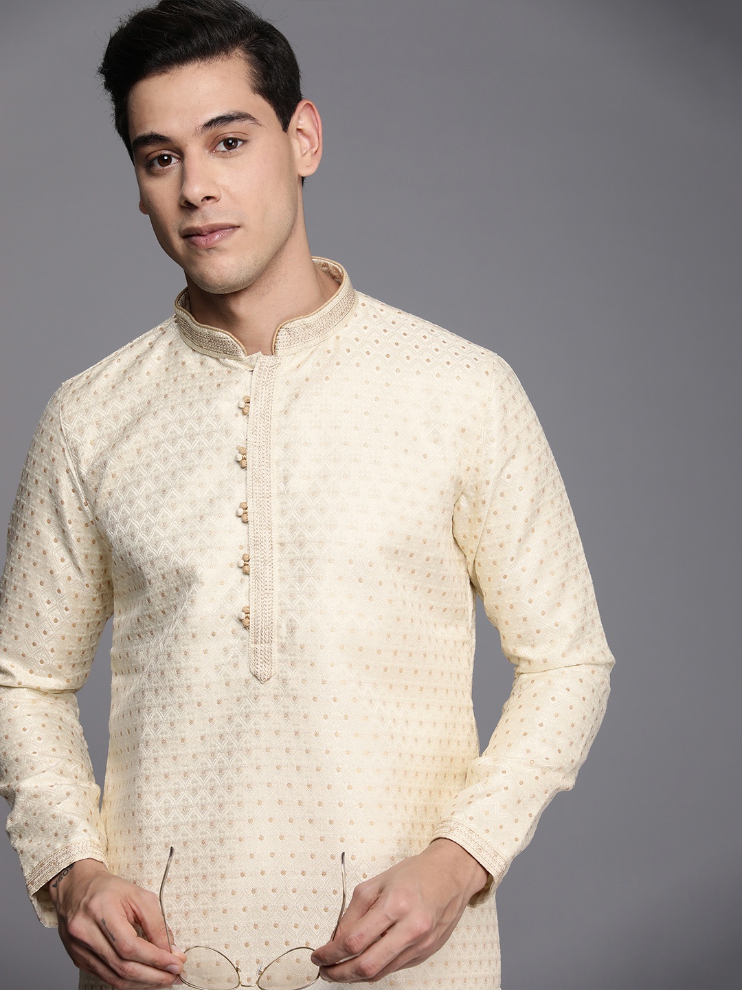 

Manyavar Men Beige Ethnic Motifs Woven Design Kurta with Churidar