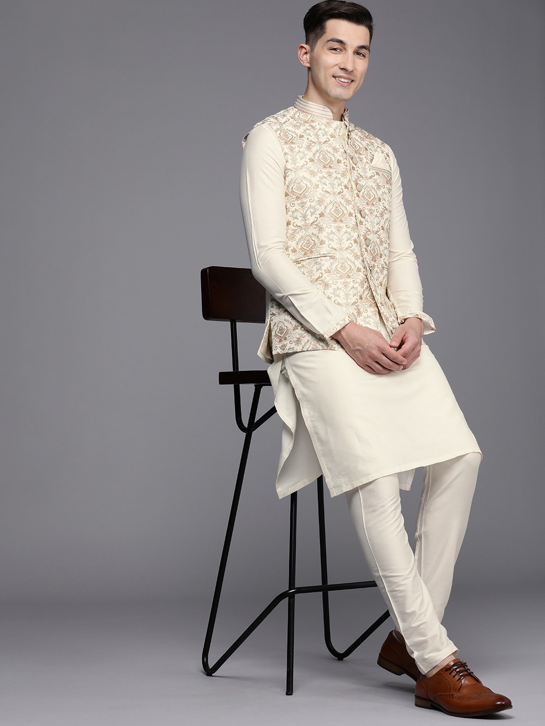

Manyavar Men Cream-Coloured Kurta & Churidar with Ethnic Motif Woven Design Nehru Jacket
