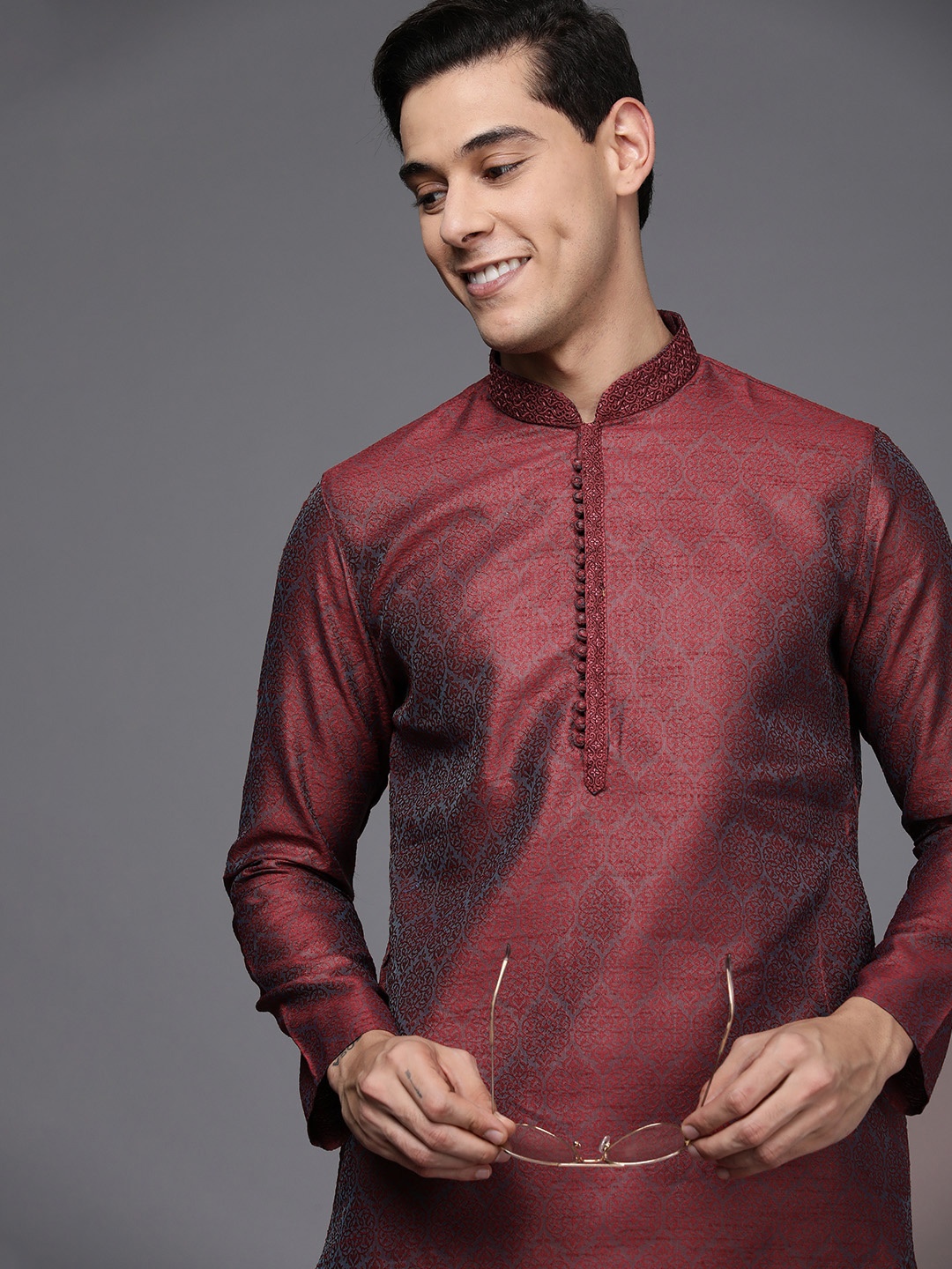 

Manyavar Men Maroon Solid Kurta with Churidar