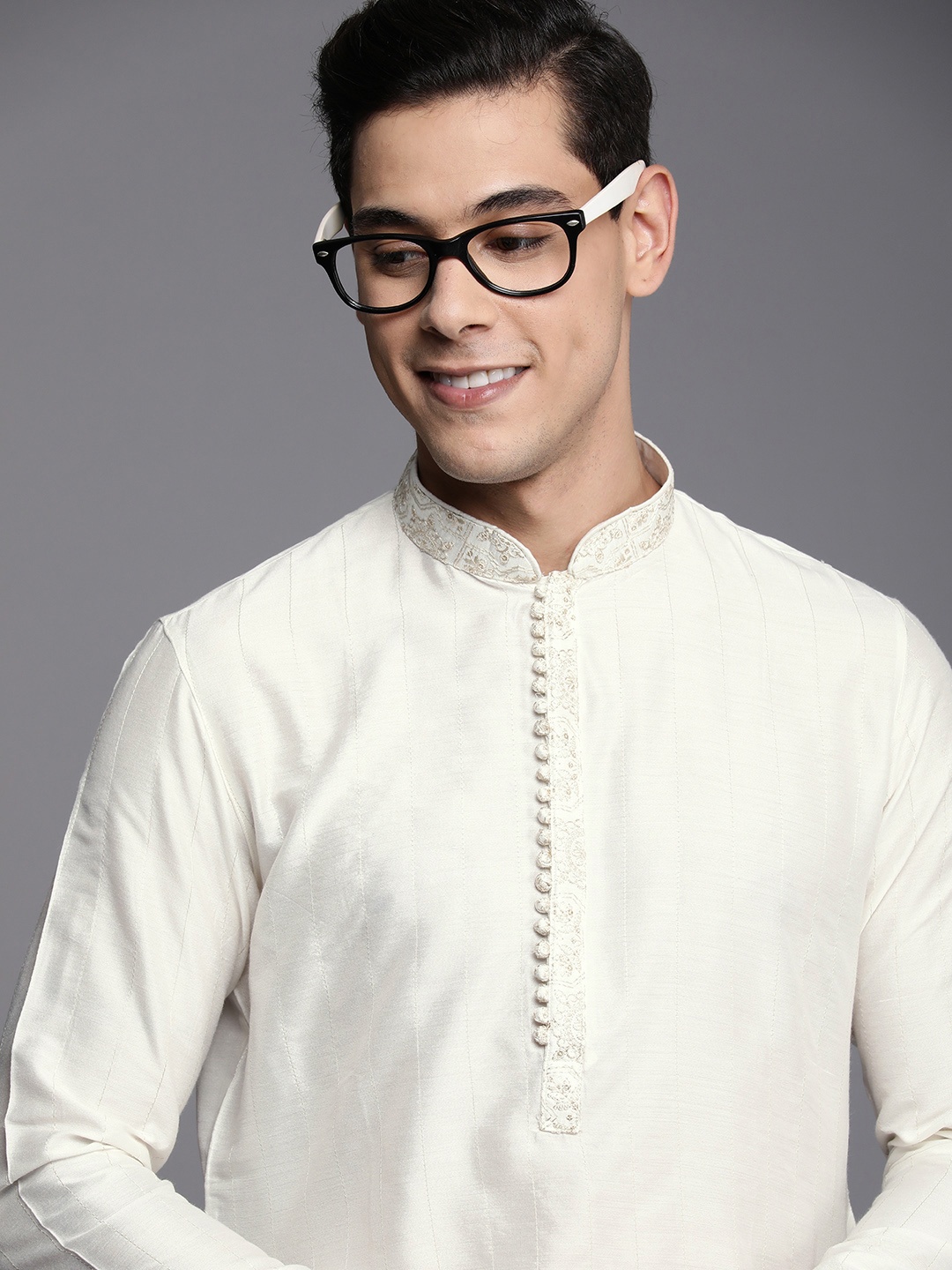 

Manyavar Men White Woven Design Kurta with Churidar