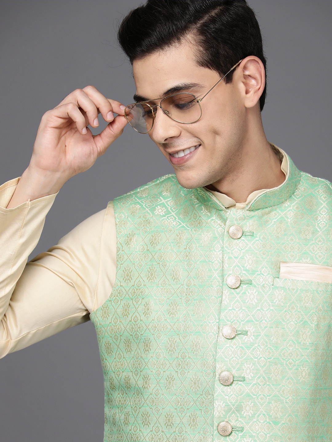 

Manyavar Men Beige Solid Kurta & Churidar with Ethnic Motif Woven Design Nehru Jacket