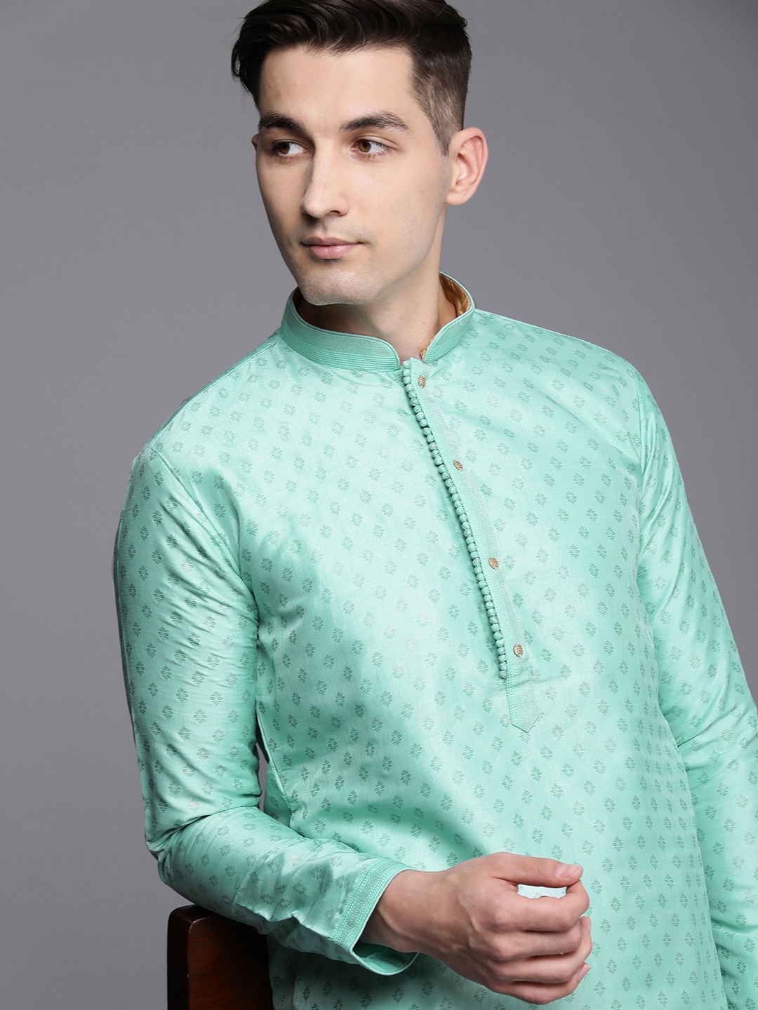 

Manyavar Men Green & Brown Ethnic Motifs Woven Design Kurta with Churidar
