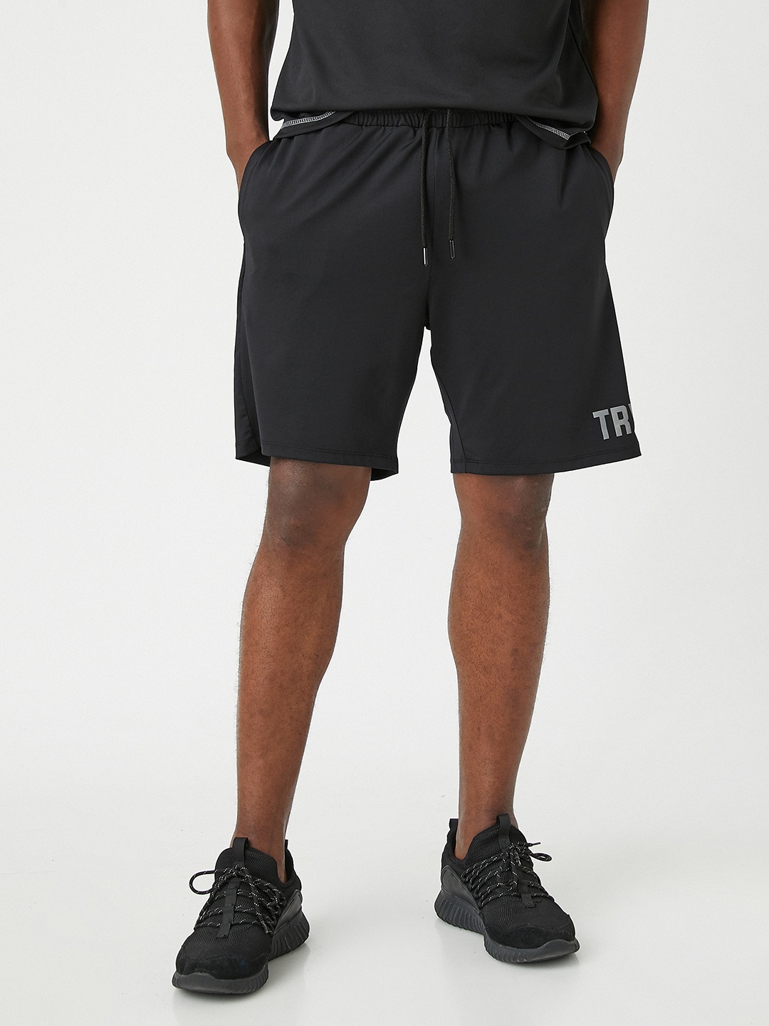 

Koton Men Black Solid Reflective Details Sports Shorts