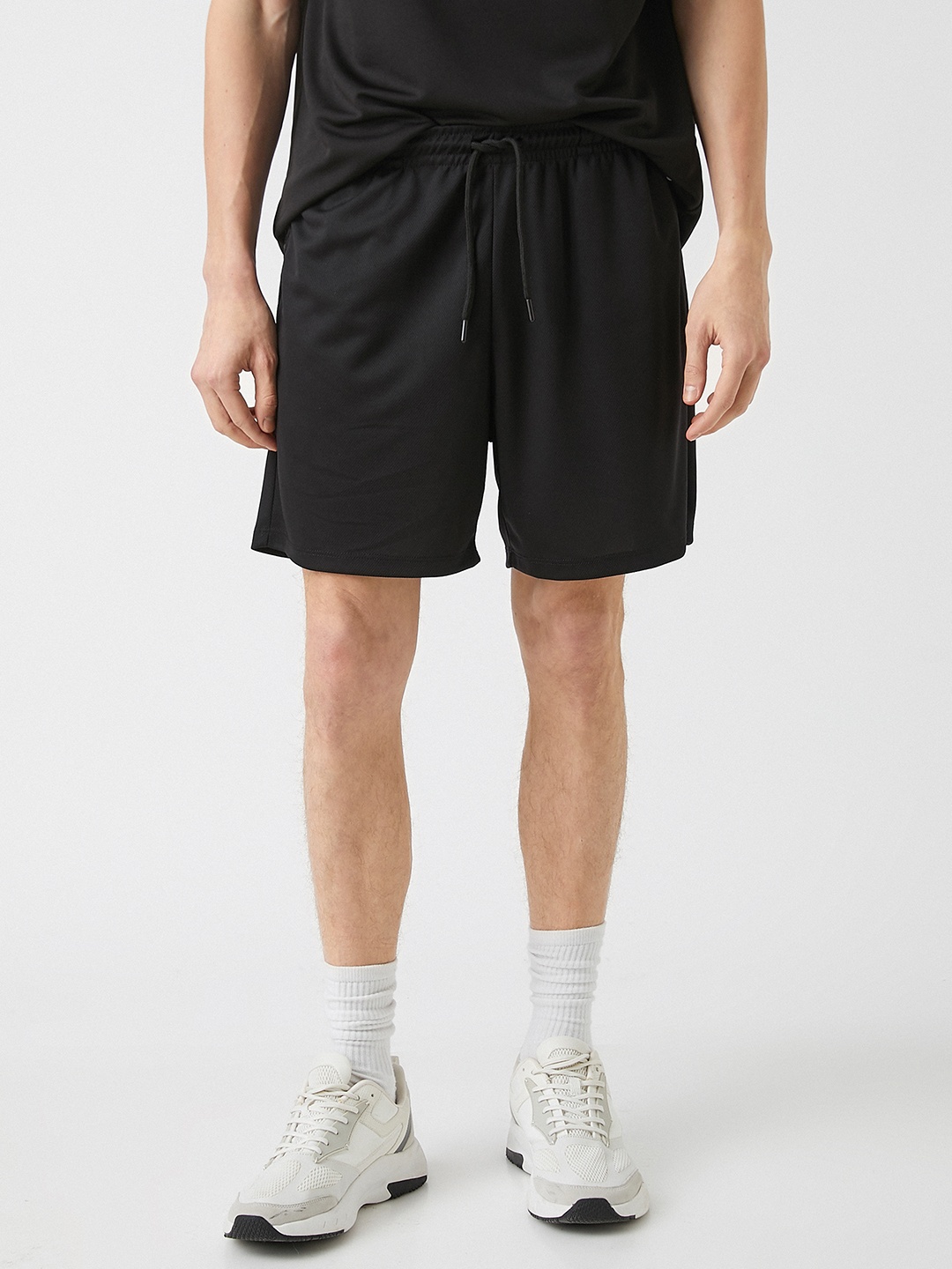 

Koton Men Black Solid Comfortable Fit Sports Shorts