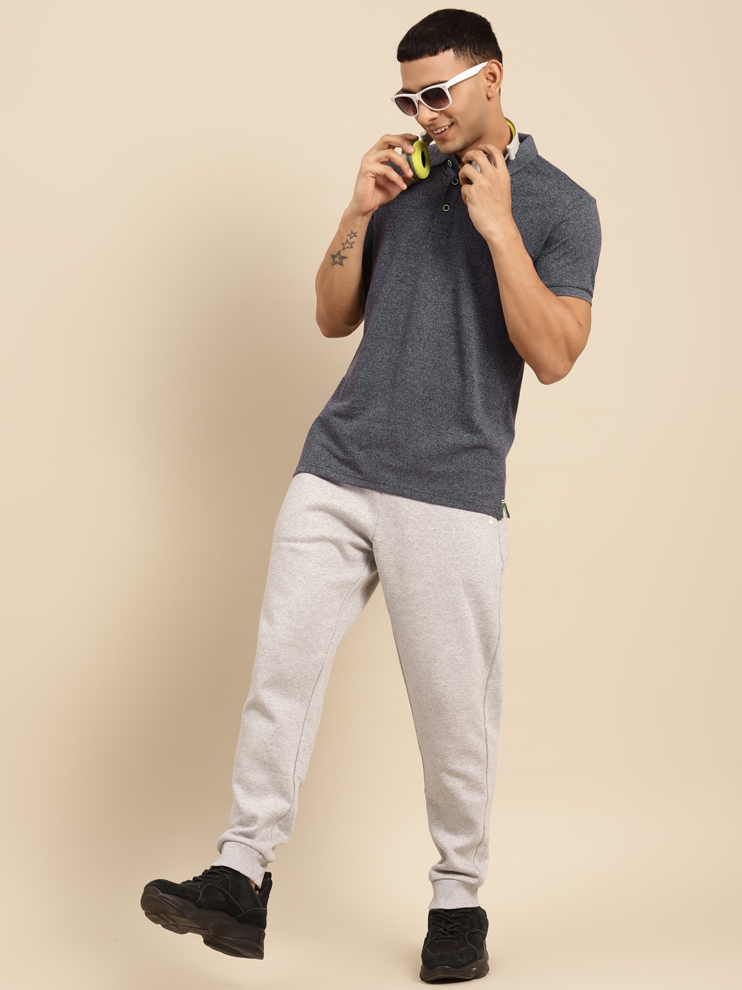 

United Colors of Benetton Men Charcoal Grey Solid Polo Collar T-shirt