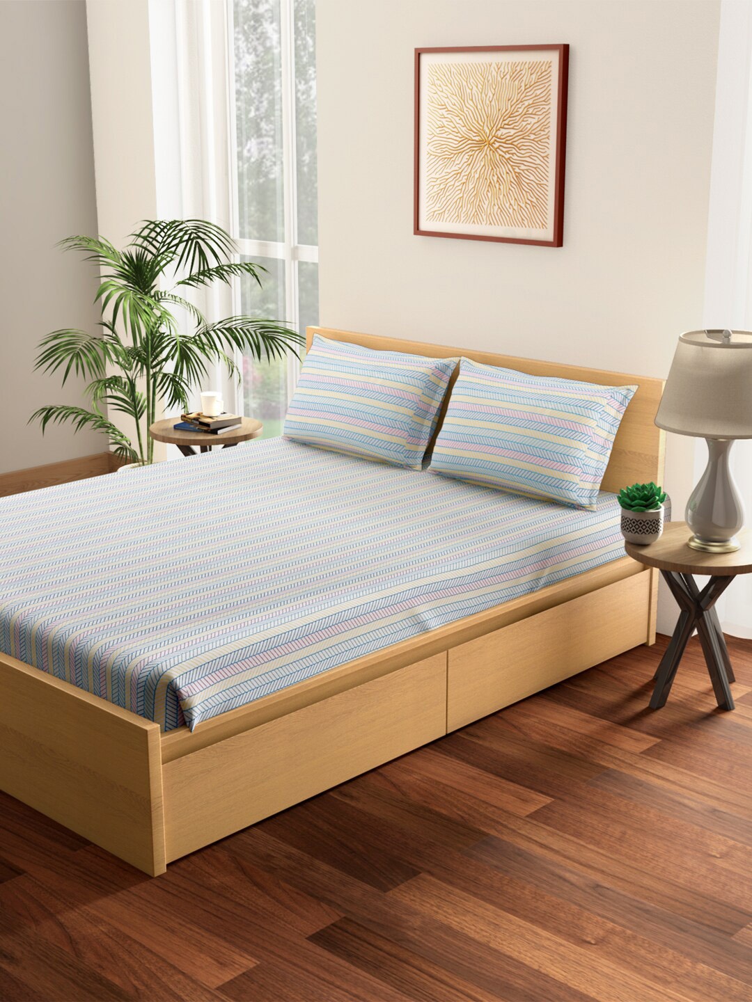 

Living scapes by Pantaloons Off White & Blue Cotton 144 TC Queen Bedsheet 2 Pillow Covers
