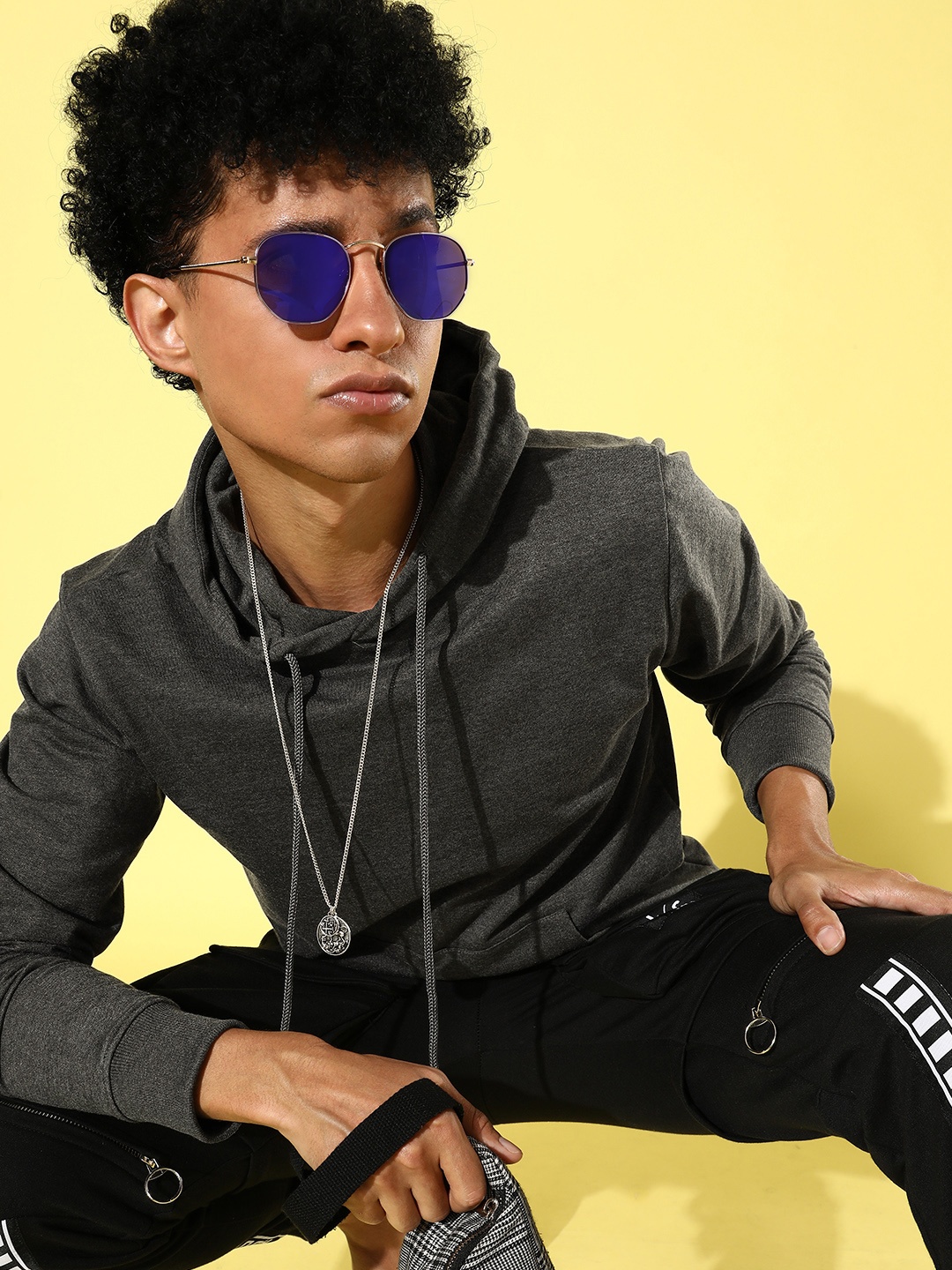 

Mast & Harbour Men Charcoal Grey Melange Solid Hooded Sweatshirt