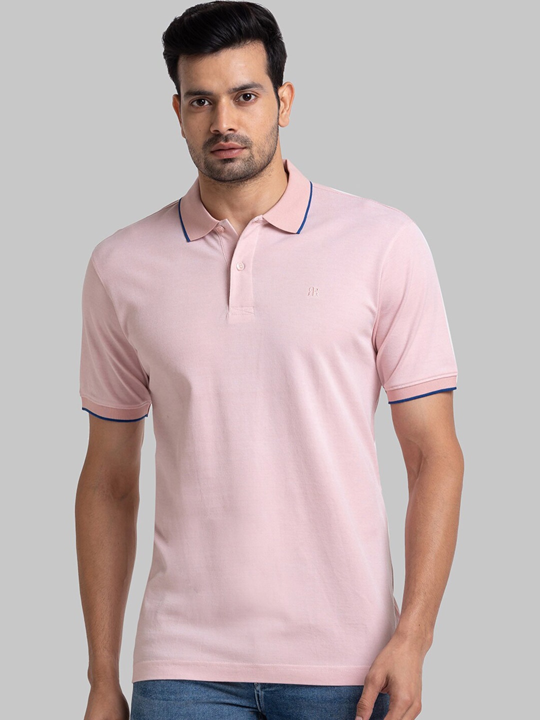 

Raymond Men Pink Solid Polo Collar T-shirt