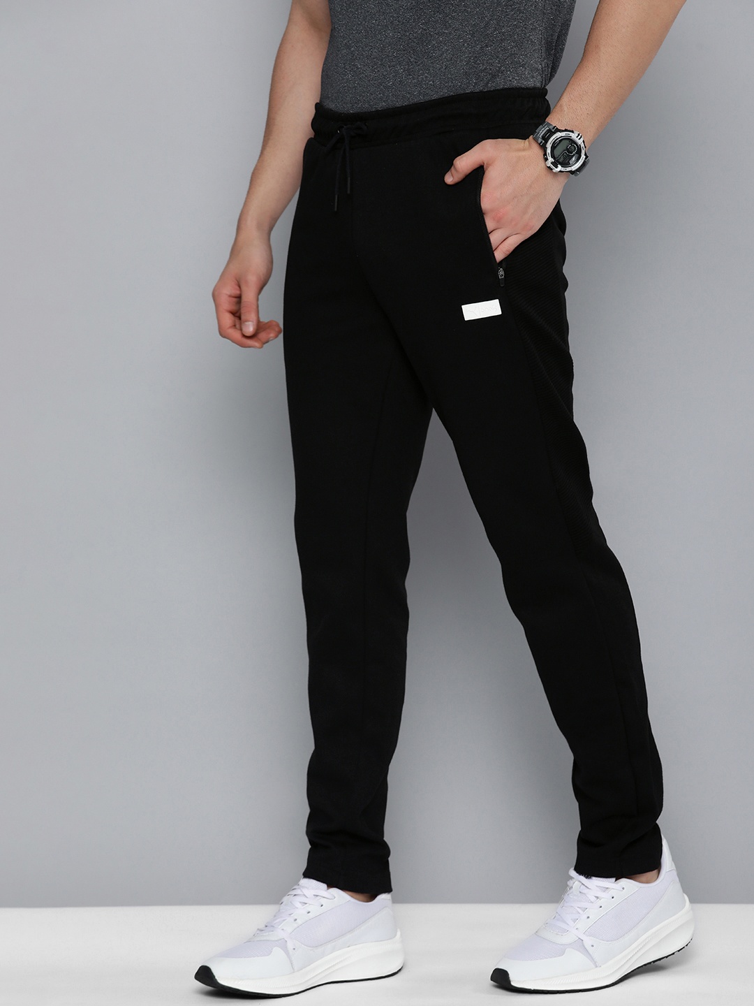 

Puma Men Black Solid Slim Fit VK Track Pants