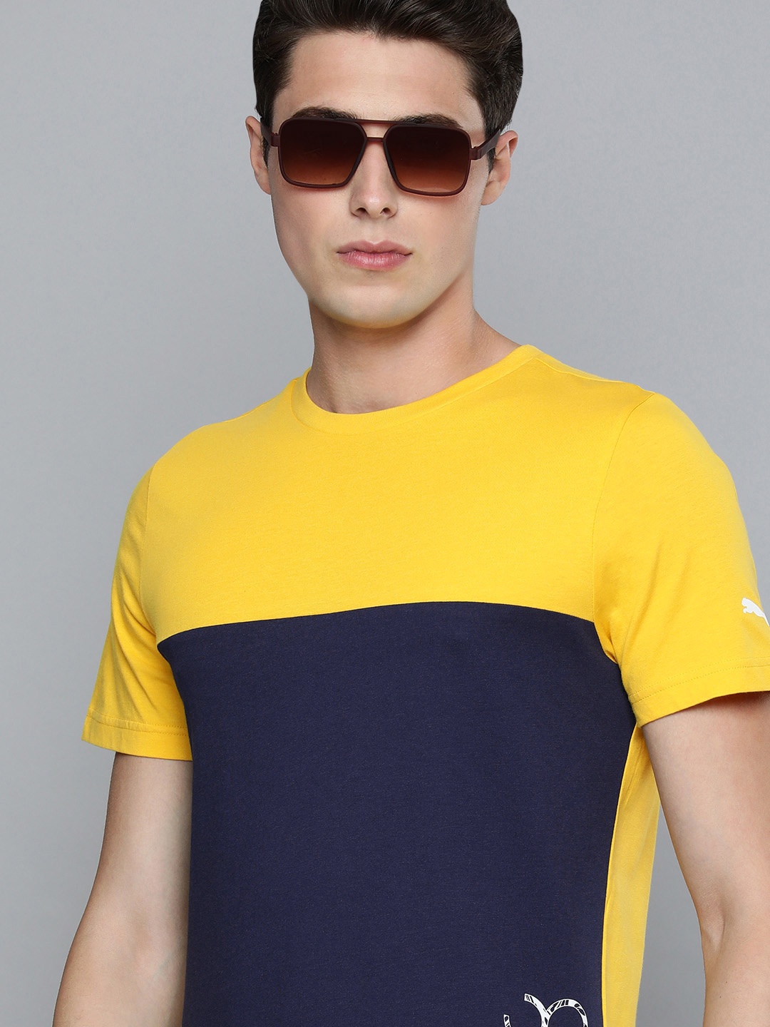 

one8 x PUMA Men Yellow & Navy Blue Colourblocked Pure Cotton Slim Fit T-shirt